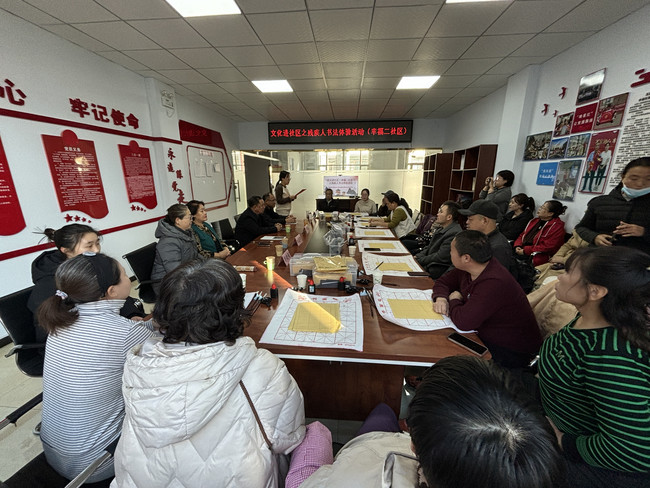 宣化区残联在工业街幸福二社区开展“书法进社区 墨香暖人心”书法体验活动  (2).jpg